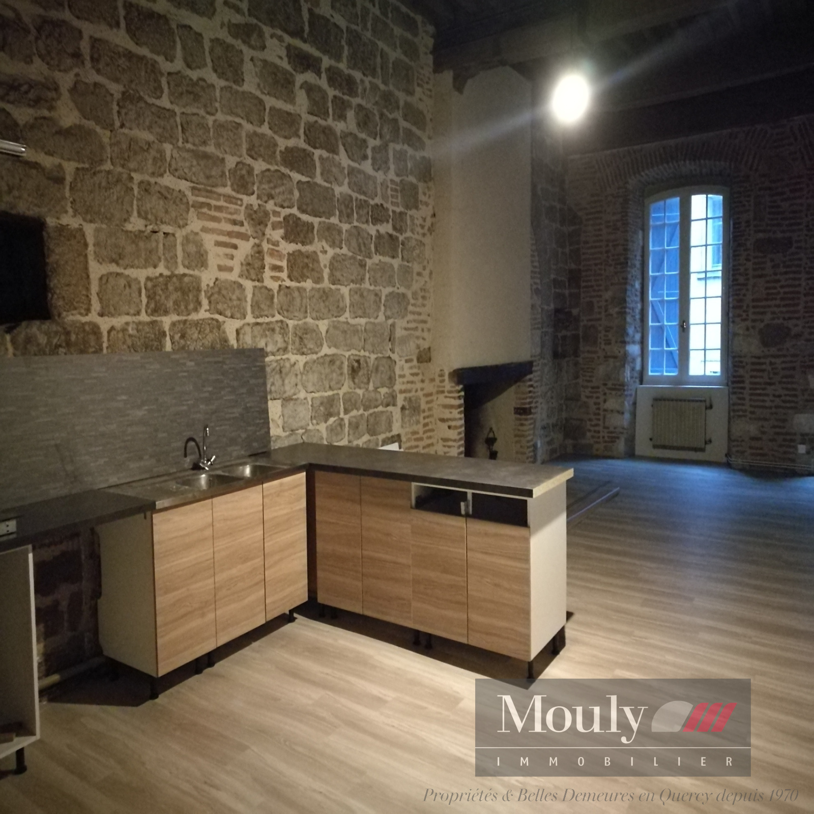 location CHARMANT T4 CAHORS CENTRE HISTORIQUE | Mouly Immobilier